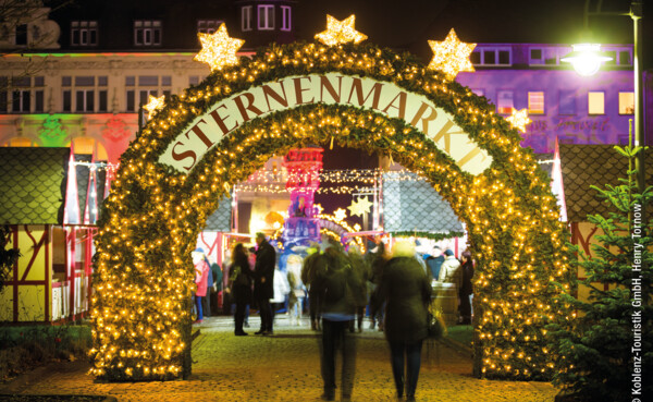 Koblenz_Weihnachtsmarkt_Goerresplatz_1_(c)Henry Tornow.jpeg © Bogentor auf dem "Sternenmarkt" ©